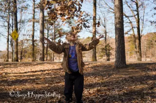 Playing In The Leaves 1616 x 1080 hig definition image